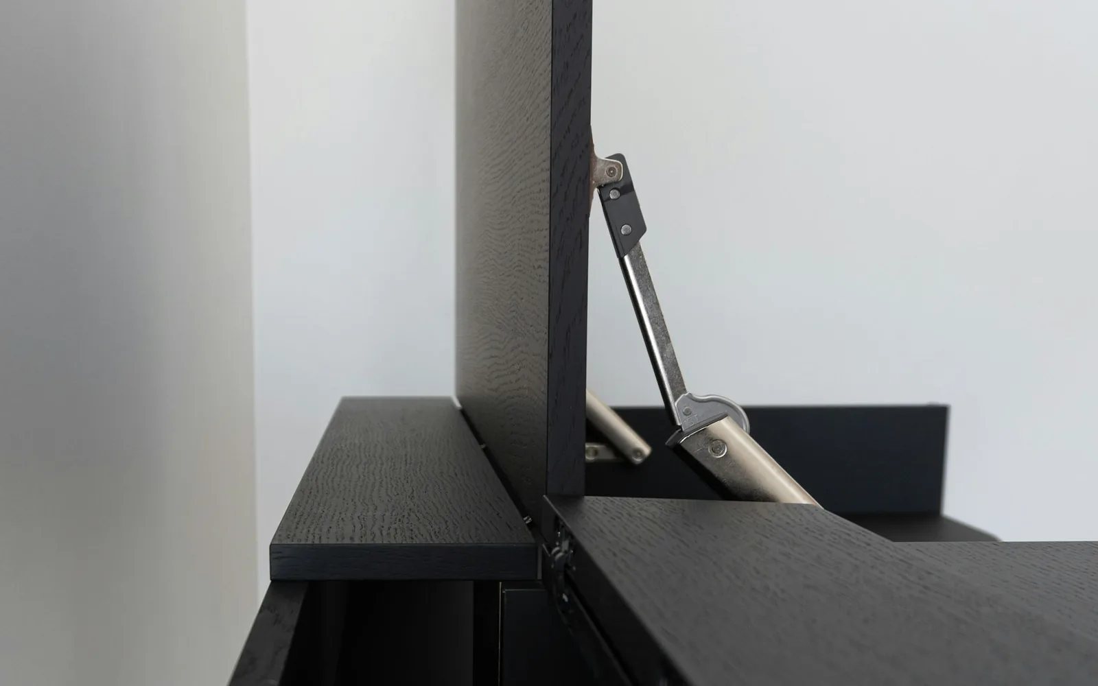 A home-office desk designed to hide and route everyday cables